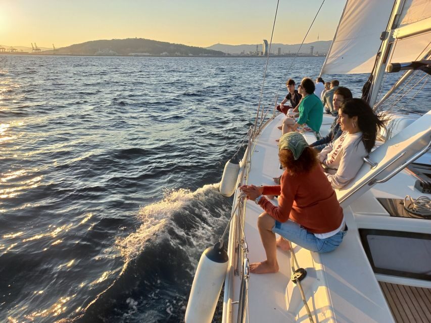 Barcelona: 2-Hour Sailboat Tour with Snacks and Drinks - Hoisted sails along Barcelona’s coast: Barceloneta, Montjuïc, Olympic towers, and Sagrada Familia