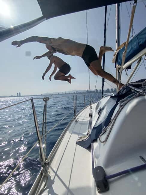 Barcelona Badalona : Sailboat Tour, Snacks, Drinks, Swimming - Try SUP on Calm Water (Your Body Gets a Break From Sitting)
