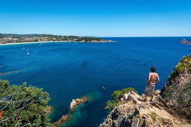 Barcelona: Costa Brava Easy Hike, Snorkel, Cliff-Jump & Meal - Stop 3: A Family Bay With Wooden Beach Huts and a Promenade
