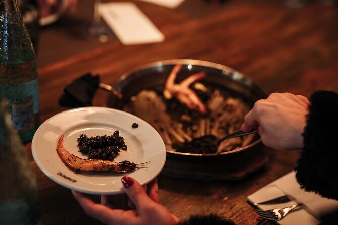 Barcelona: Guided Food Walking Tour with Tapas and Wine - Stop 3: Carrer de la Mercè and the history-heavy bodega moment