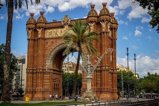 Barcelona Highlights Small Group Tour with Hotel Pick Up - The waterfront approach: Las Ramblas, La Boqueria, and Barceloneta from the van
