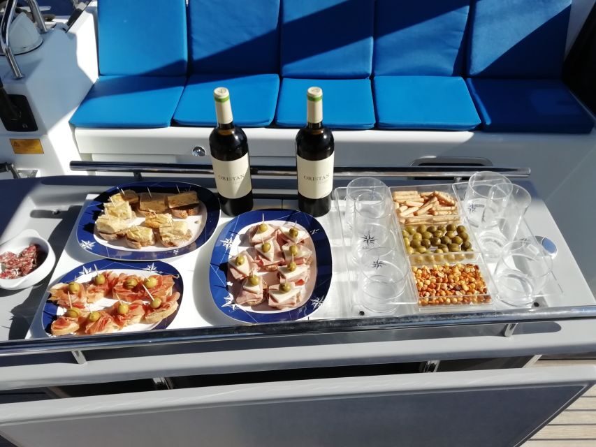 Barcelona: Luxury Private Yacht Daytime Cruise - Cava, snacks, towels, blankets, and the onboard music setup