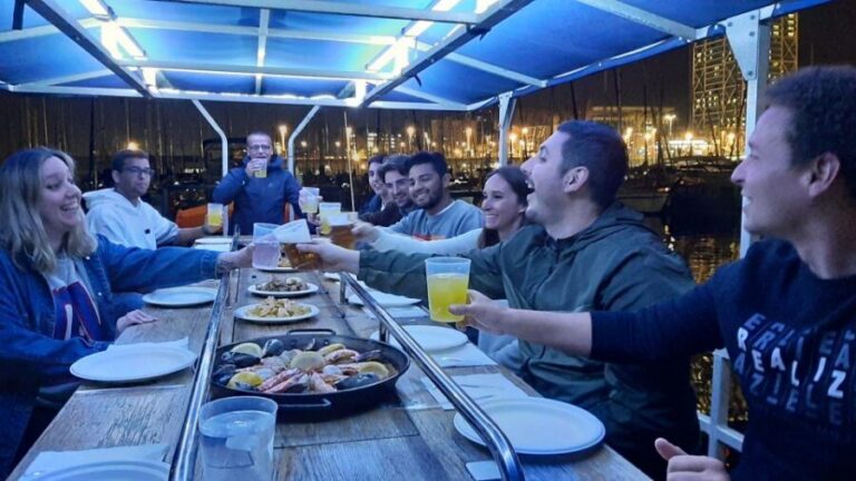 Barcelona: Private Evening Cruise with Dinner and Drinks - Dinner on the water: paella, sangria, and what you really get