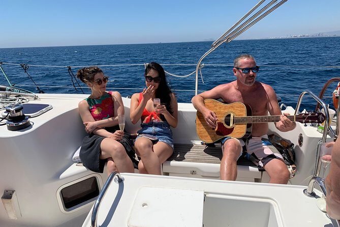 Barcelona Private Sailing Tour with Drinks for Family and Friends - Captain energy, customized hosting, and music with your own playlist