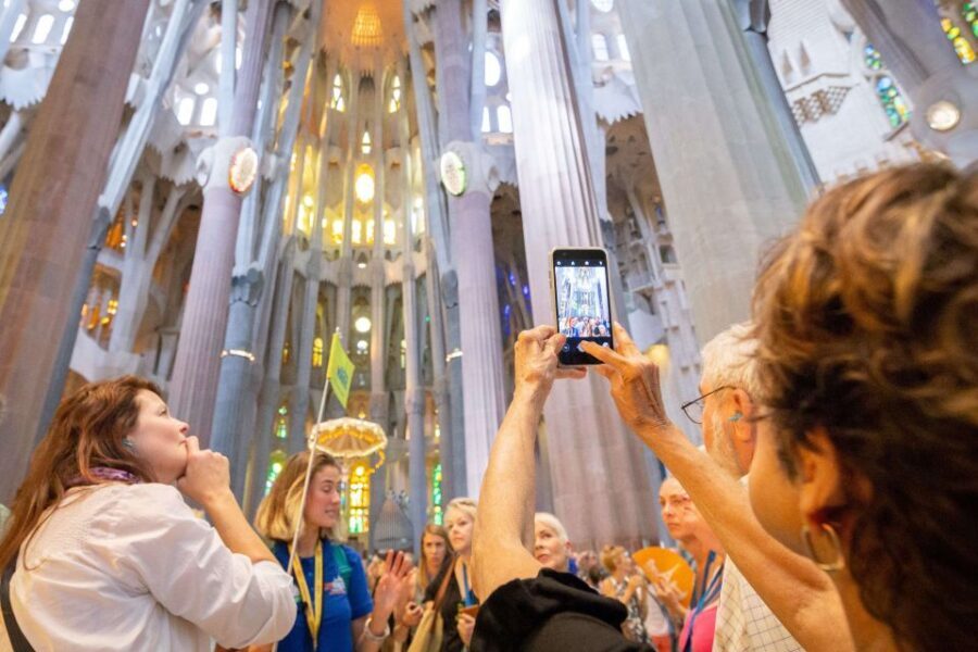 Barcelona: Sagrada Familia and Park Guell Combo Guided Tour - Inside Sagrada Família: stained glass, soaring columns, and the symbolism guide