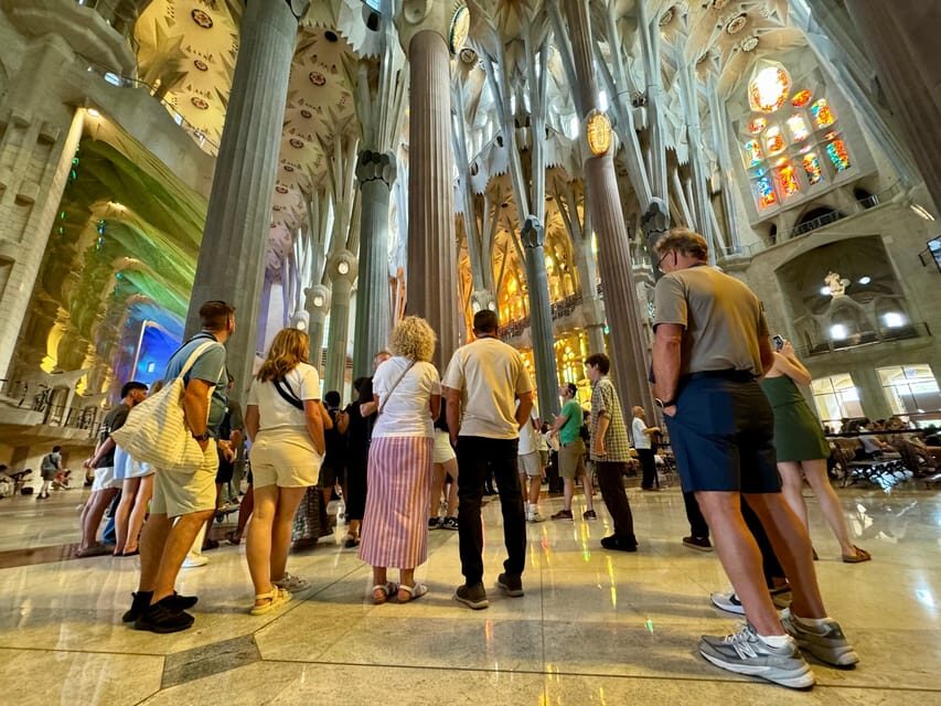 Barcelona: Sagrada Familia Entry Ticket and Guided Tour - Inside the basilica: tree-like columns and stained-glass that shifts