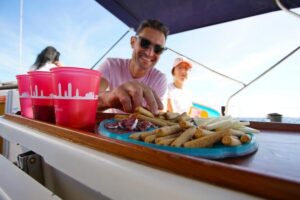 Barcelona: Sailing Tour with Spanish Tapas and Drinks - The “Bombon” check-in: timing, meeting point, and basic logistics
