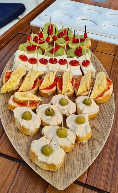 Barcelona: Sailing Tour with Spanish Tapas and Drinks - Tapas and drinks on board: good value, not just “snacks”