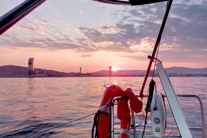 Barcelona Sensational Sunset Tour with Open Bar and Snacks - Port Vell after dark: Old Harbor, malls, and a huge aquarium zone