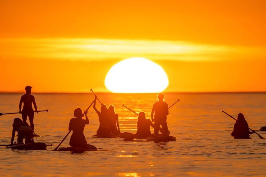 Barcelona: Sunrise Paddleboarding with Instructor and Photos - In the water at sunrise: 90 minutes of guided calm