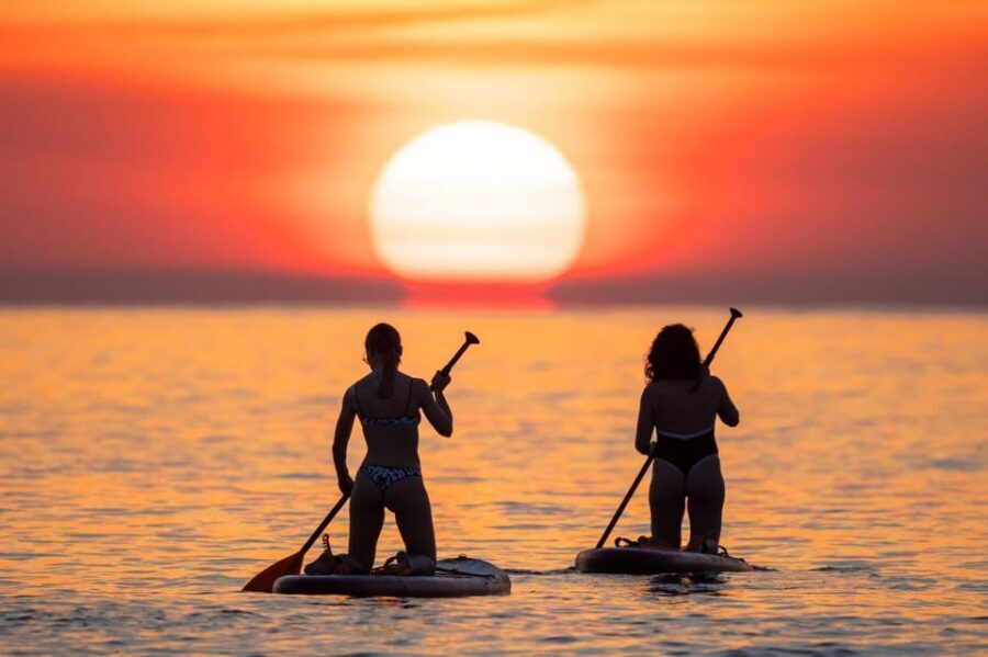 Barcelona: Sunrise Paddleboarding with Instructor and Photos - The beach break and the return to the school