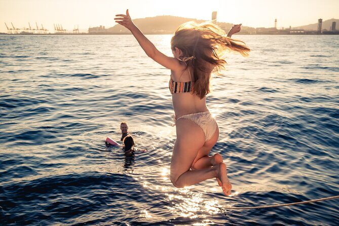 Barcelona Sunset Cruise with Light Snacks and Open Bar - Landmark spotting from the water: what you’ll likely see