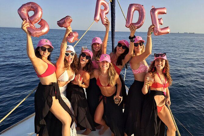 Barcelona Sunset Sailing Cruise from Port Olímpic with Open Bar - Maremagnum from pontoons: shopping center views that feel like you’re floating