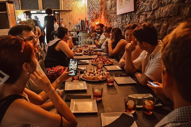 Barcelona Tapas Walking Tour: Food, Wine & History - How tapas works locally: sharing, ordering, and pacing