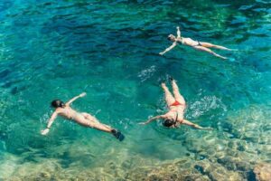 Barcelona: Tossa de Mar Kayak & Snorkel Tour w/3-Course Meal - Snorkeling in clear water and the optional adrenaline moment