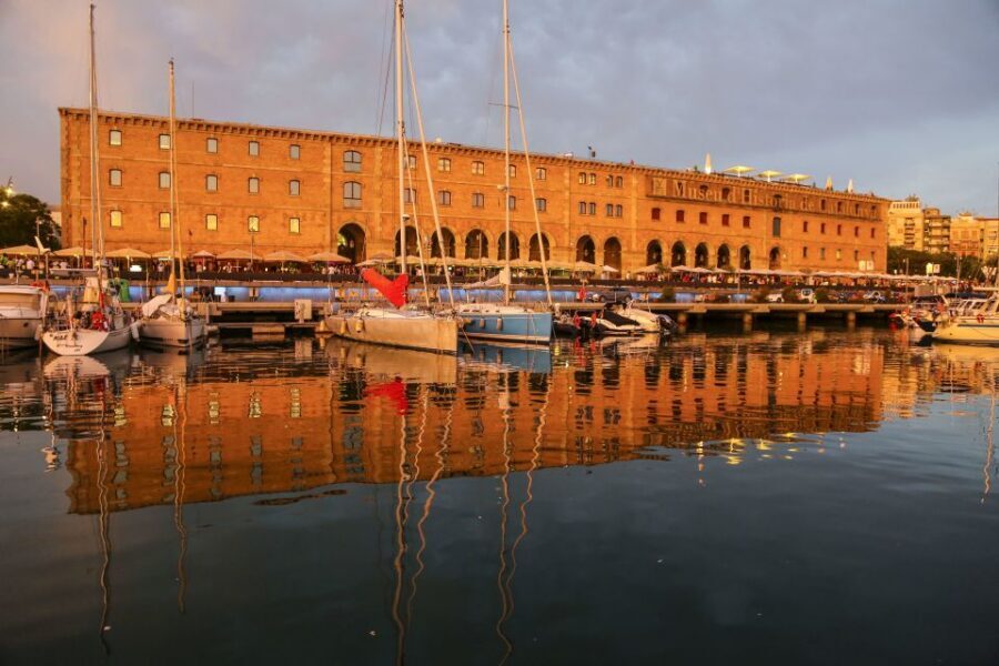 Barcelona: Unique Sunset Sailing Tour with Tapas & Open Bar - The Vibe On Board: Couples, Friends, and Solo Evenings
