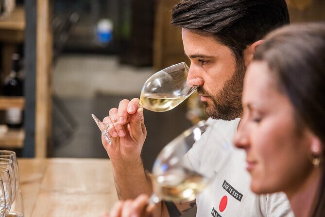 Barcelona: Wine Tasting and 5 Course Tapas Pairing Dinner - Key highlights you’ll feel right away