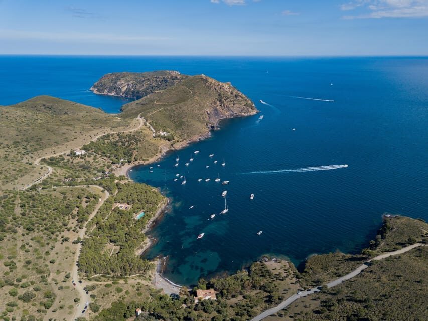 Cap Norfeu: Costa Brava Catamaran Trip with Underwater Views - Passing the Highlights: Lighthouse, Castle of La Trinitat, and El Bulli Country