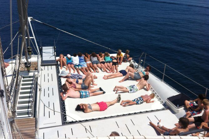 Catamaran ride -Costa Brava with barbecue and drinks. Familiar. - A Catamaran Cruise That Mixes Views, Food, and a Swim Stop