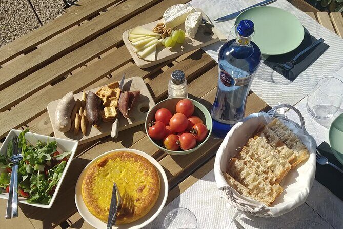 Cava tour to 3 family wineries with hotel pick-up - Stop 2: Giro del Gorner’s Five-Century Cellar and Garden Lunch