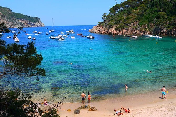 Costa Brava Small Group with Hotel Pick up and Boat Ride - Sant Feliu de Guíxols: scenic road, beach time, and a real fishing town walk