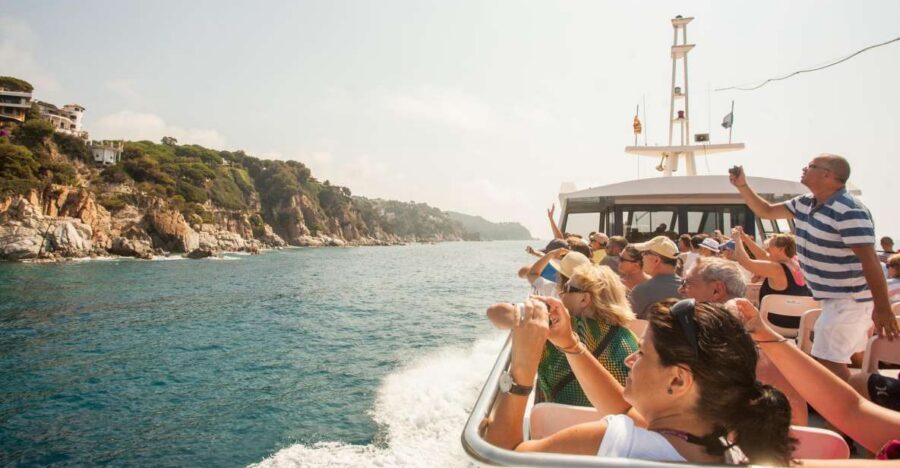 From Barcelona: Costa Brava Day Tour with Boat Trip - Lloret de Mar: seaside lanes plus St. Roma modernism