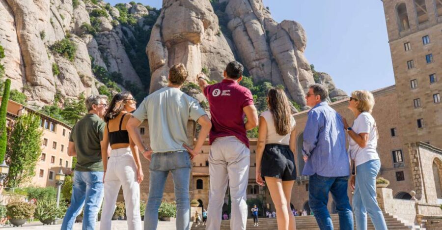 From Barcelona: Half-Day Montserrat Experience - Meeting in central Barcelona, then getting out of the city fast