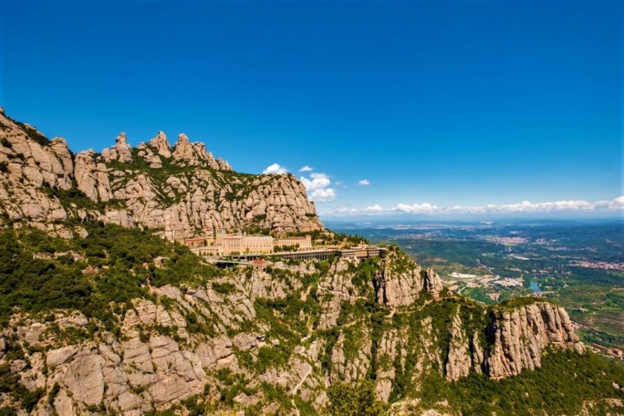 From Barcelona: Montserrat Monastery, Easy Hike, Cable Car - The Montserrat Monastery Tour: Cloister, Chapel Stops, and Art You Can Read