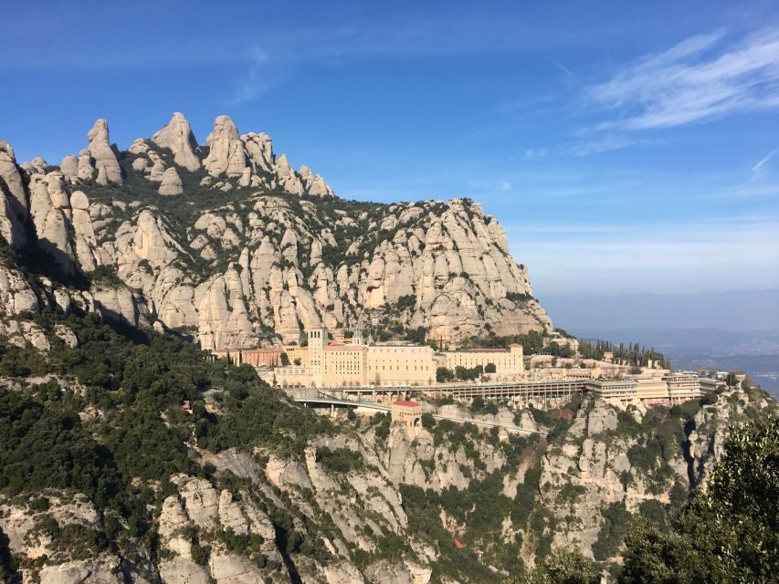 From Barcelona: Montserrat Monastery & Scenic Mountain Hike - Time Back at the Monastery Area: Browsing the Market Without Panic