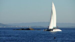From Roses: Sunset Catamaran Cruise - What Happens on Board: Music, Sangria or Cava, and Slow Moments