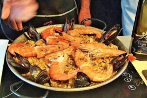 La Boqueria Market and Paella Cooking Class in Barcelona - The tapas and wine: your crash course in Spanish eating