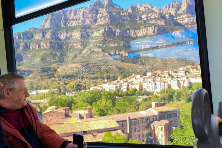 Montserrat Small Group Tour with Train and Cable Car - Cable Car Up: The Best Views Come Early