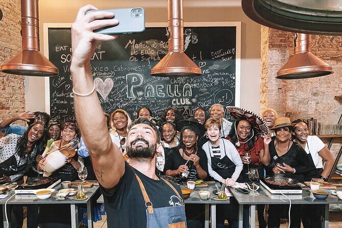 Paella Cooking Class with Professional Chef: Four Course Dinner - Pair work, group tasting, and why the vibe matters