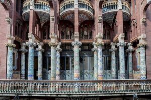 Palau de la Musica Catalana Guided Tour - Stairs, glass balusters, and tiled underside details up to the second floor