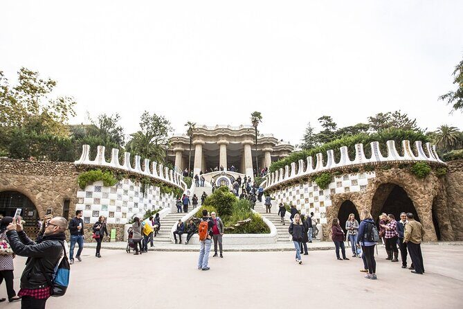 Park Guell Guided Tour with Skip the line Ticket - The main square and snake bench: Gaudí’s humor in architecture form