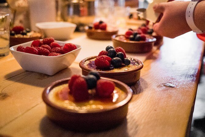 Premium Paella Cooking Class & 10 Spanish Tapas - Tapas and Wine Tasting: How the Meal Teaches Spanish Gastronomy