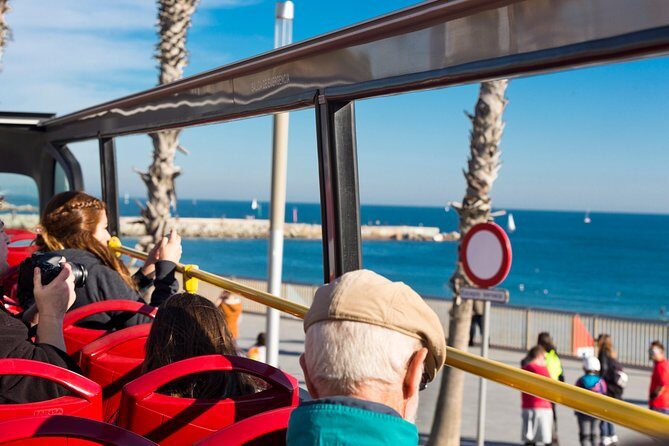Shore Excursion: Barcelona City Tour Hop-On Hop-Off - Audio guide system and onboard perks: headphones and Wi‑Fi