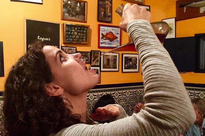 Sip, Sites & Bites Barcelona Food, Drinks & History Tour - The final Gothic Quarter tavern: wine, food, and a surprise payoff