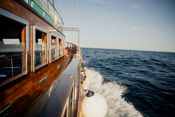 Wooden Boat Sailing with Tapa and Welcome Drink - Stop 1 at Moll de les Drassanes: the “get settled, then look up” moment
